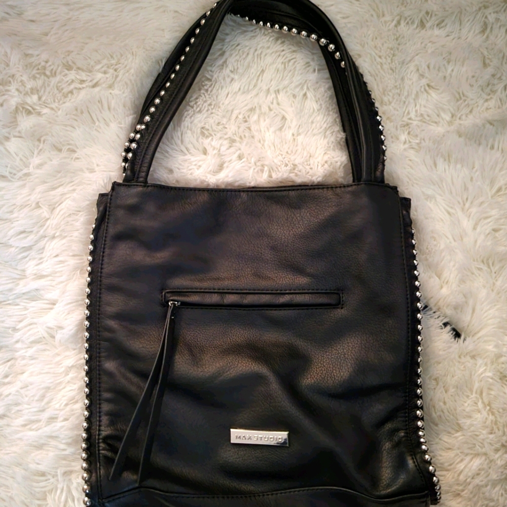 Max studio leather like material with studs